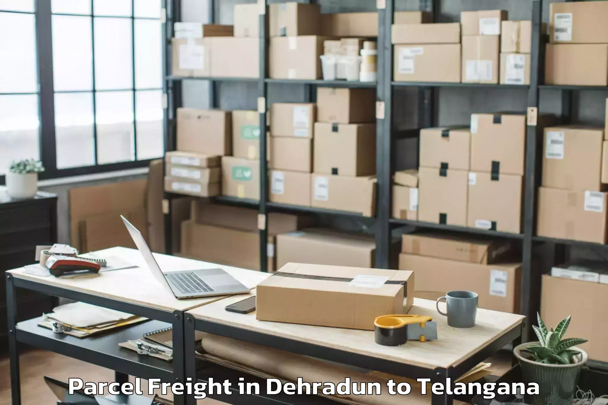 Easy Dehradun to Kamareddi Parcel Freight Booking